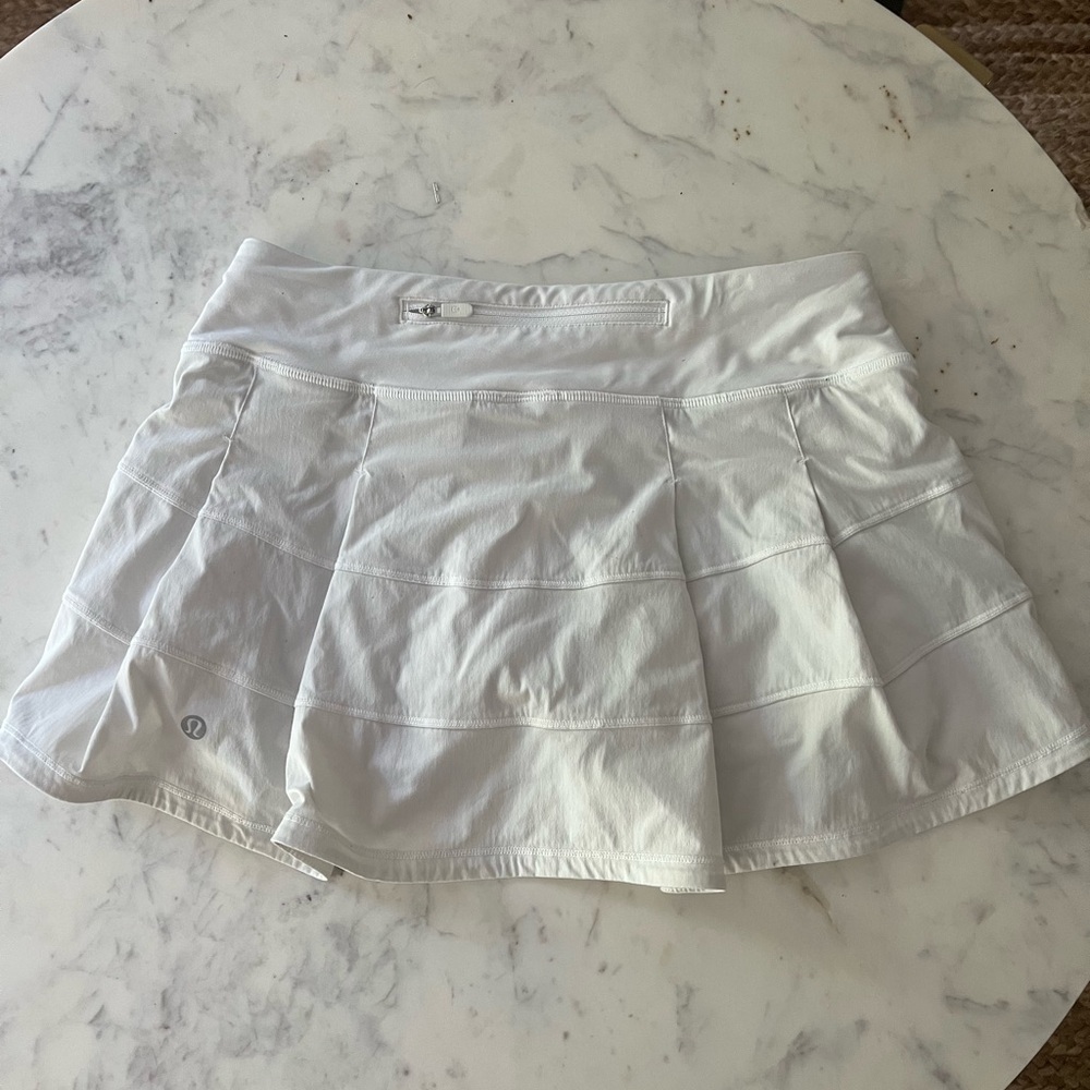 Size 4 White Short Pace Rival tennis skirt.